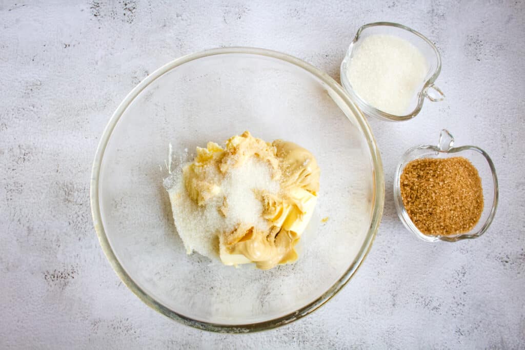 Add sugars to butter mixture.