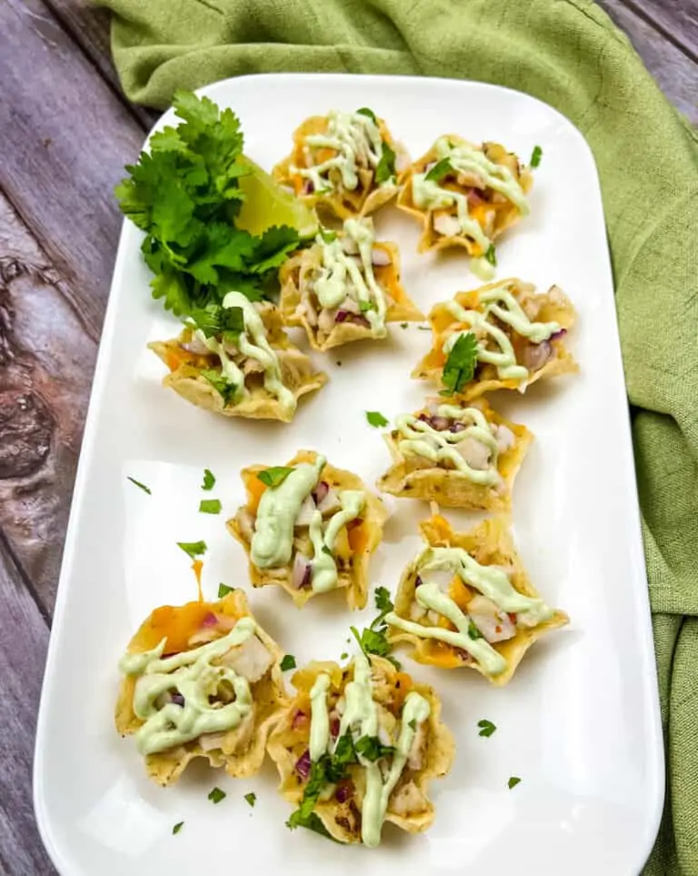 chicken tortilla cups on a white platter