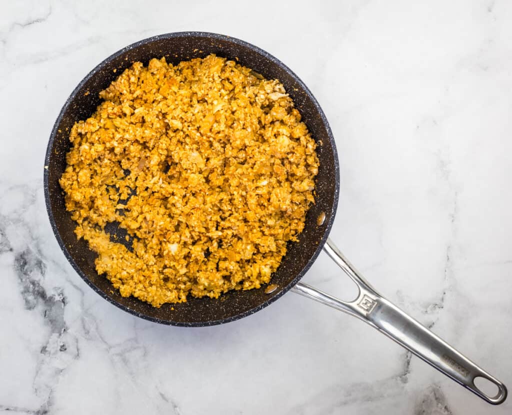 Simmer and serve the vegan cauliflower mexican rice