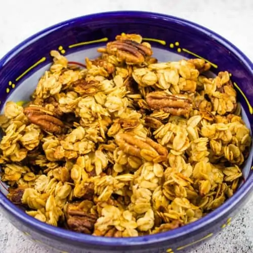 maple pecan granola in a blue bowl