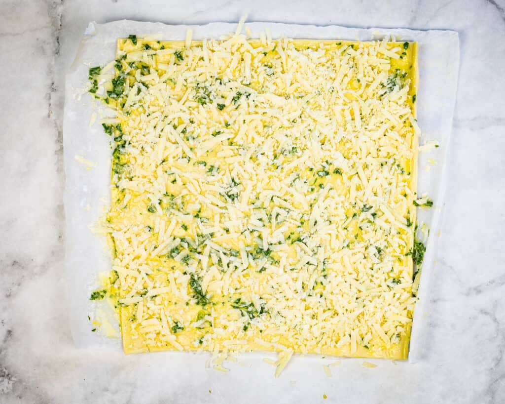 add parmesan to proscuitto puff pastry pinwheels