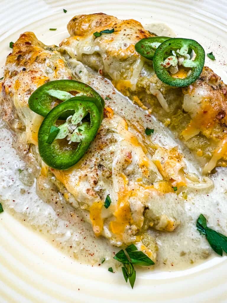 a closeup of smoked chicken enchiladas.