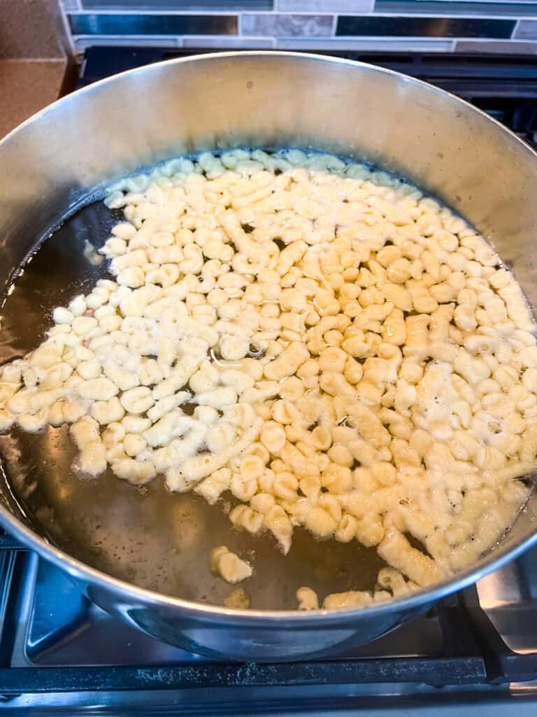 Simmering the spaetzle.