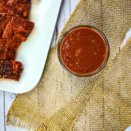 finished chipotle bourbon bbq sauce with pork on the side