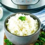 A bowl of cooked rice in front of the Instant Pot.