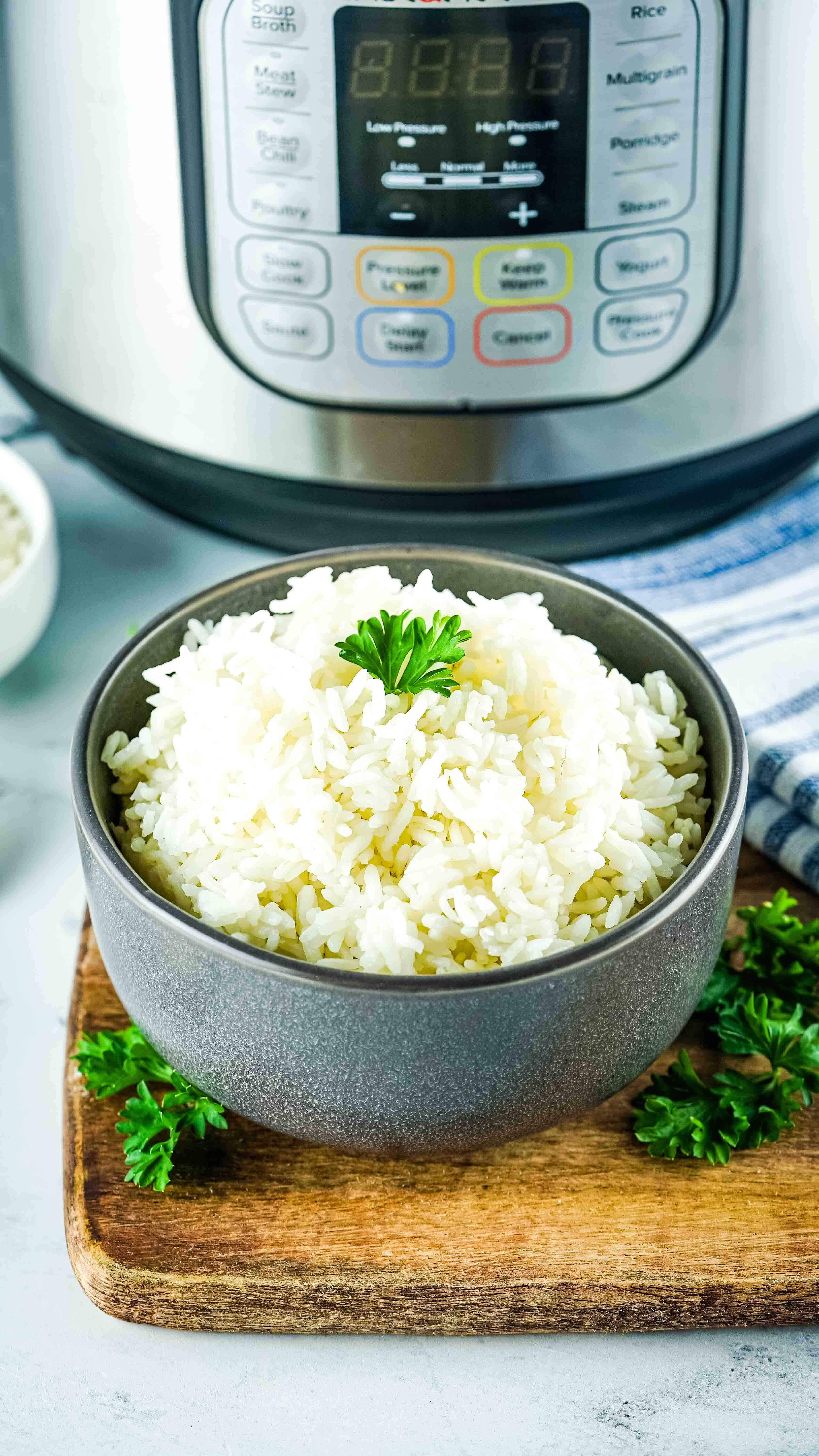 a bowl of cooked rice in front of the Instant Pot