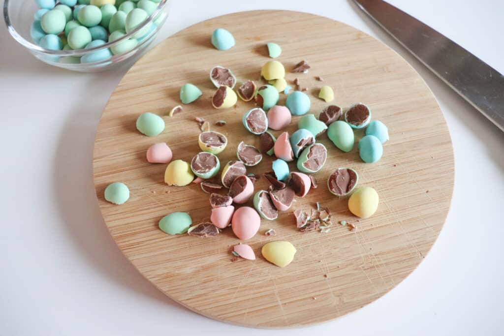 crushed mini eggs to top mini egg cookies