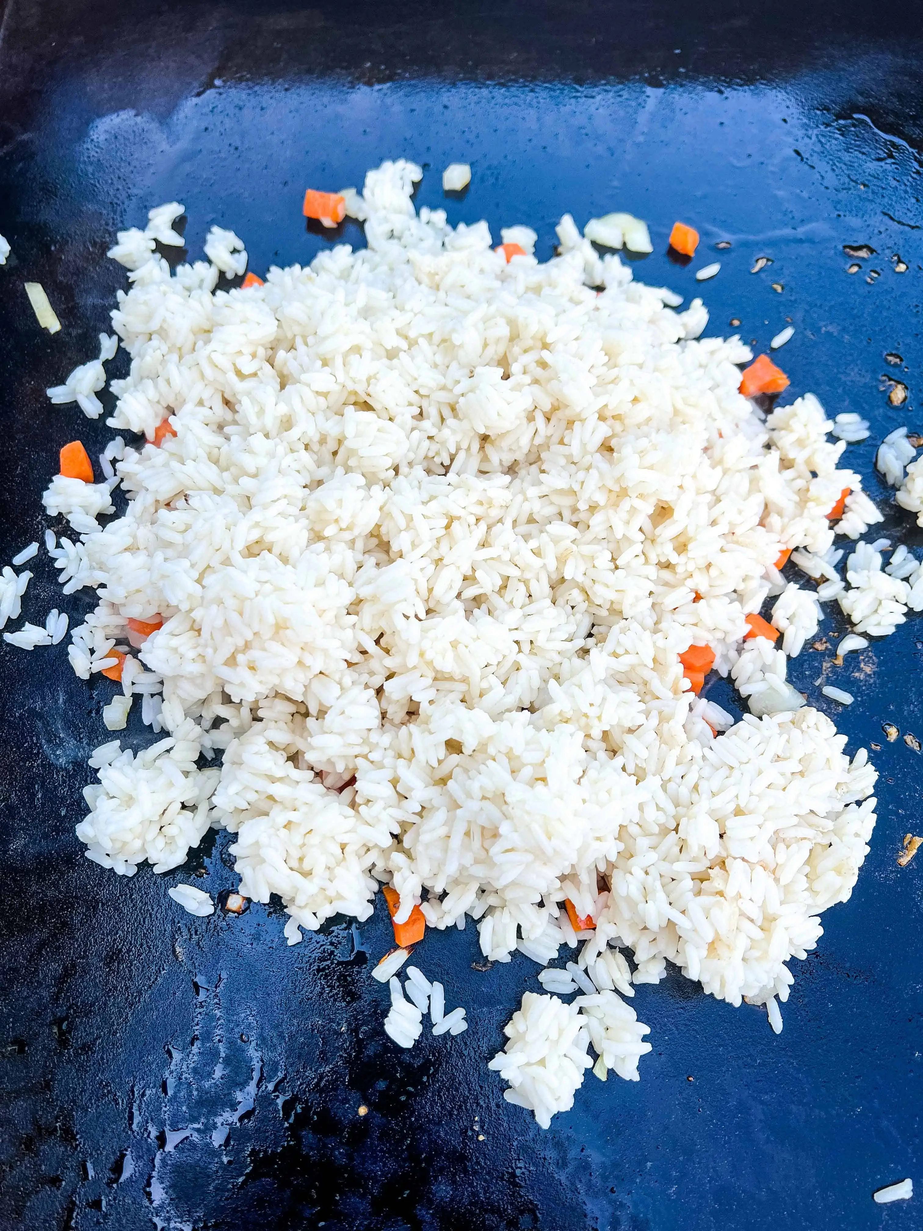 add the rice to the vegetables