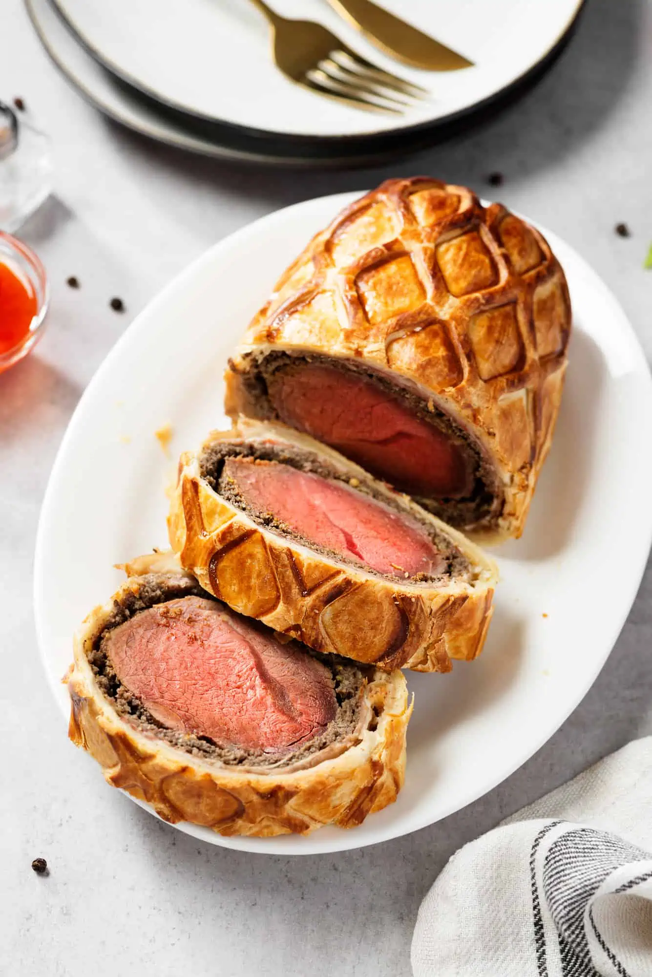 sliced beef wellington on a plate