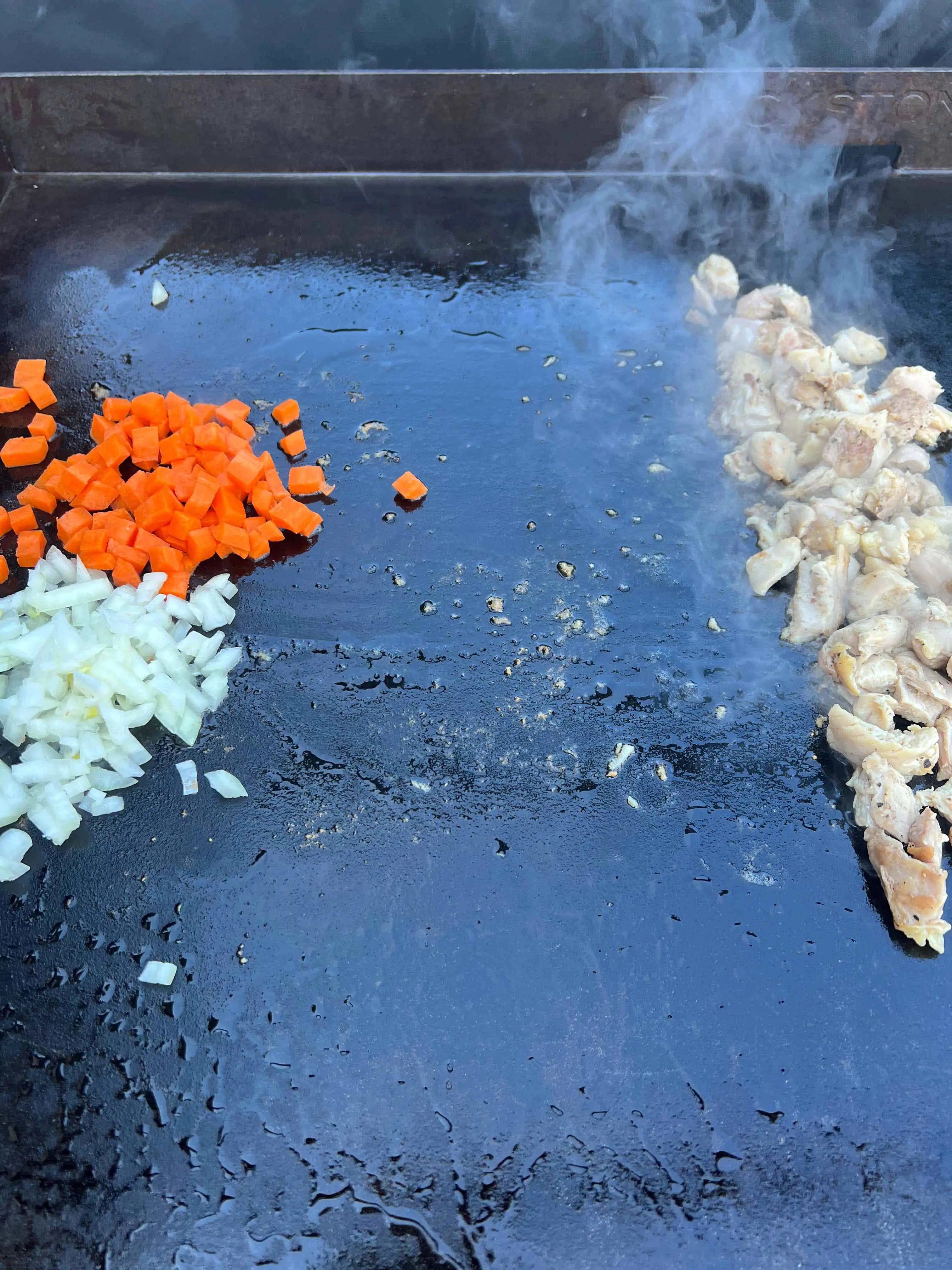 sauteeing the veg while the chopped chicken cooks