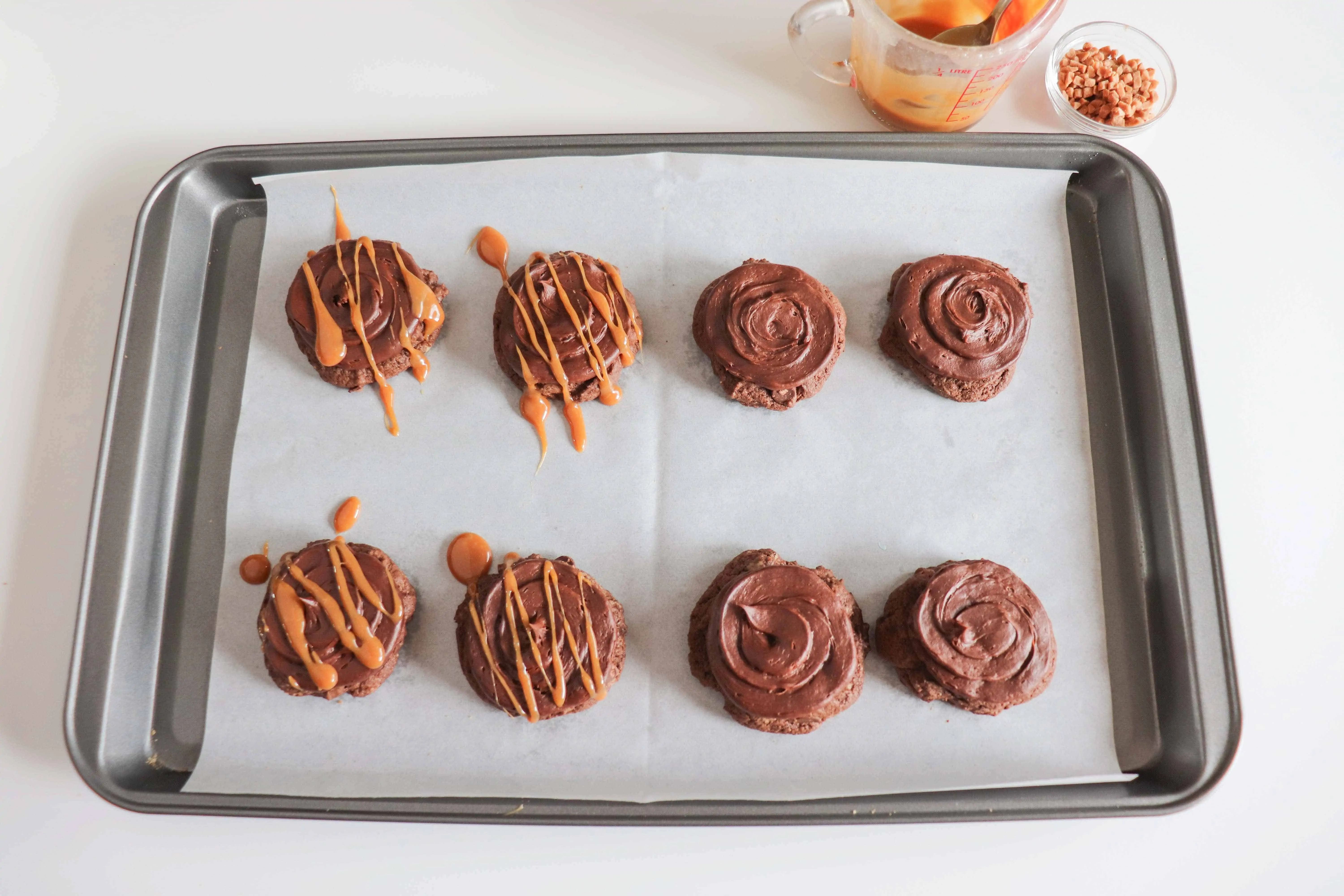 chocolate caramel cookies drizzled with caramel