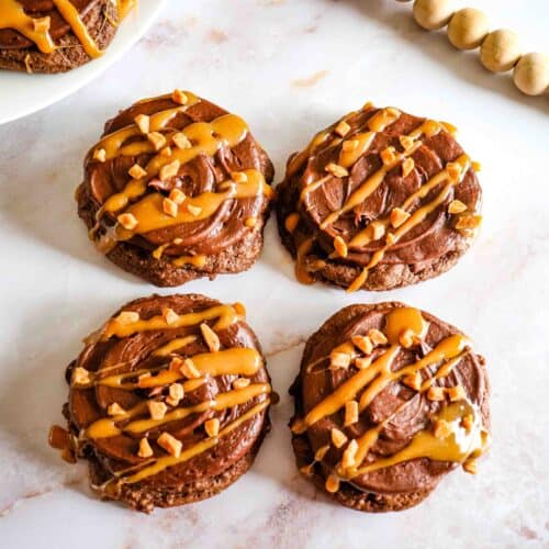 Chocolate caramel cookies on a counter top.