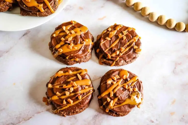 Chocolate caramel cookies on a counter top.
