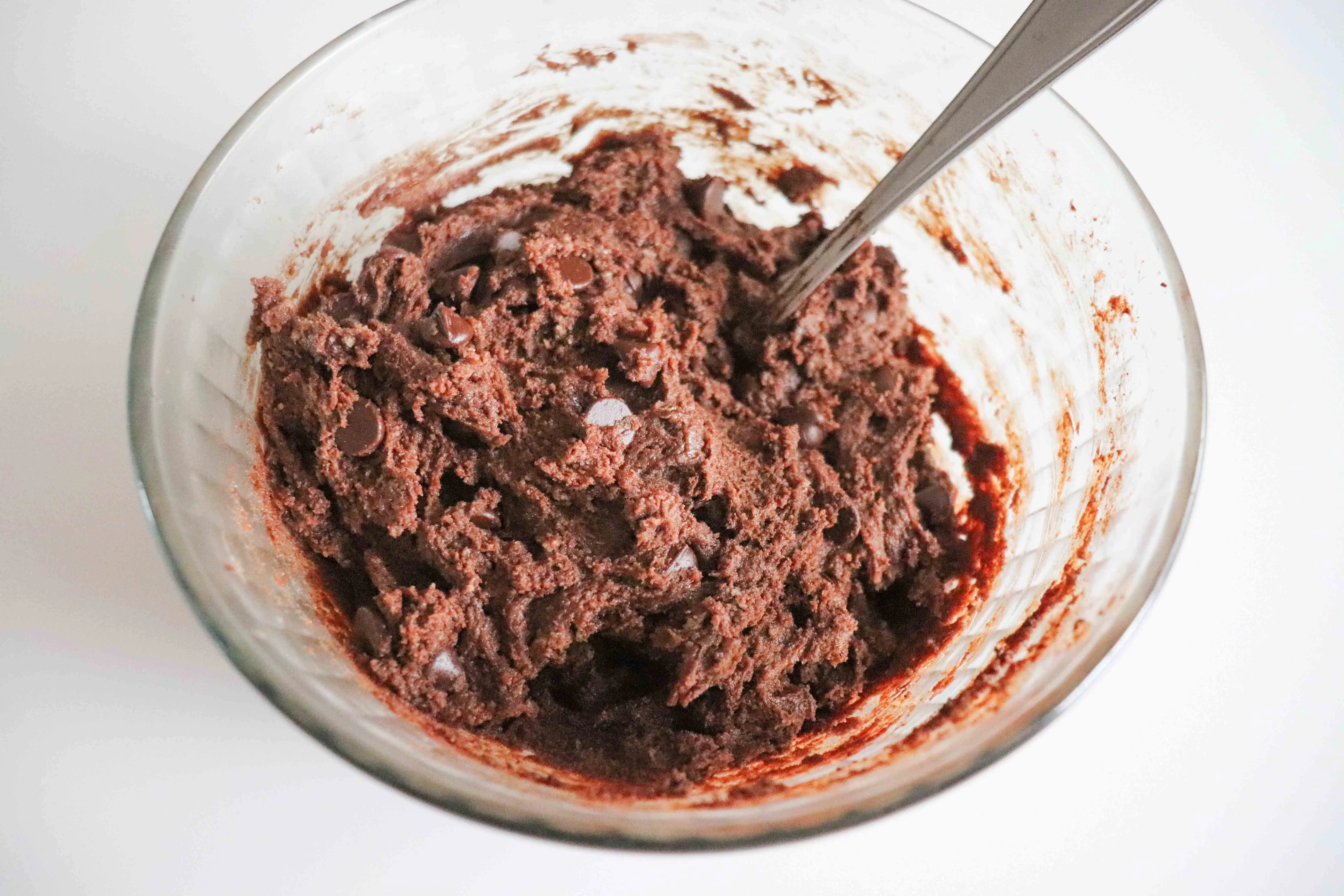 Mixed cookie dough in a bowl.