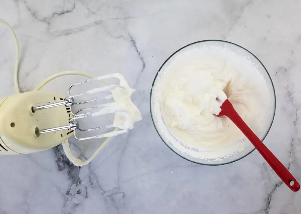 cream whipped into stiff peaks with added gelatin