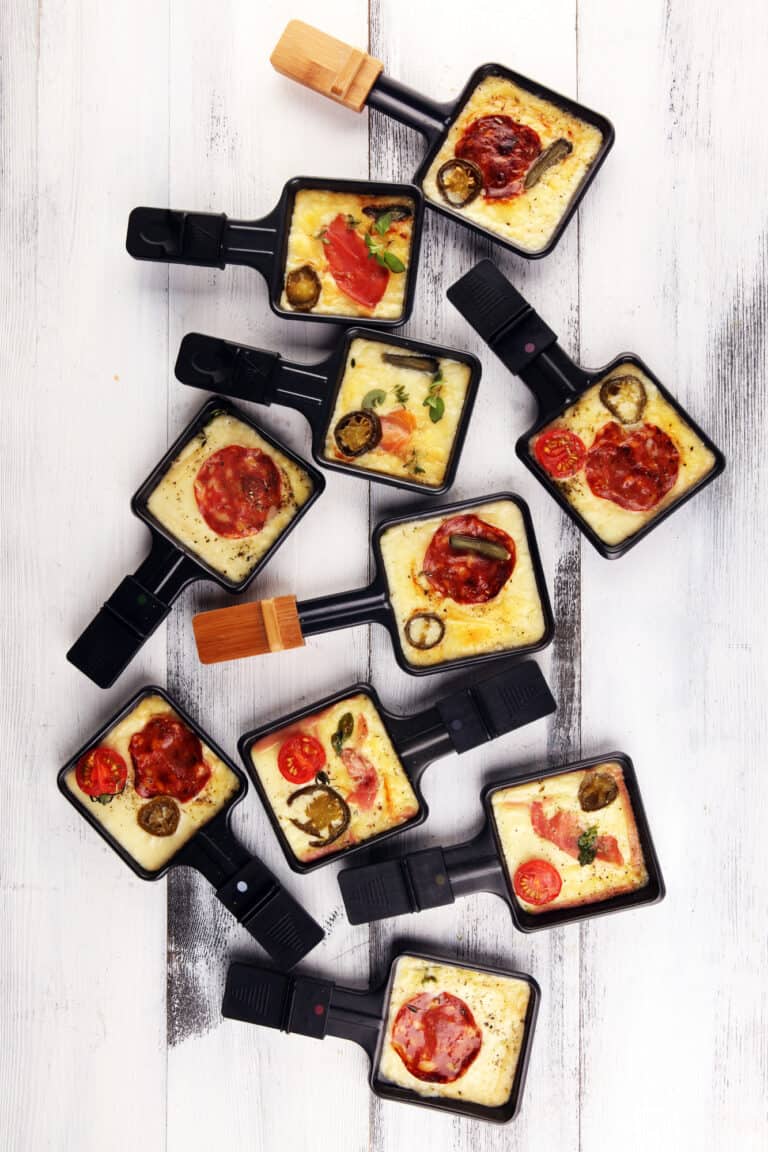 raclette cheese and tasty bites in raclette cups