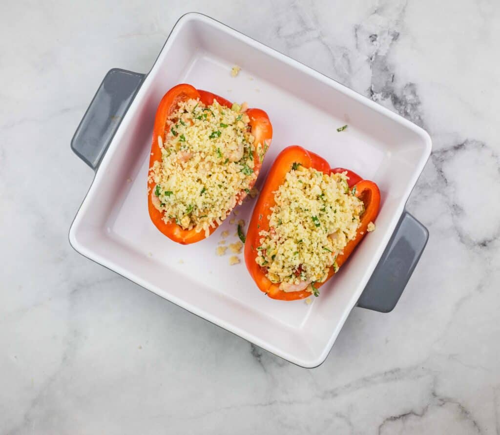 Seafood Stuffed Bell Peppers in a baking dish.