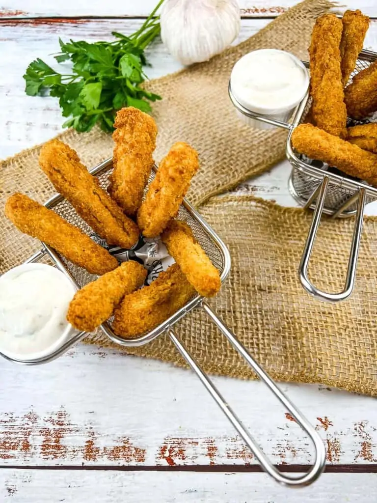 air fryer chicken fries in baskets with dipping sauce