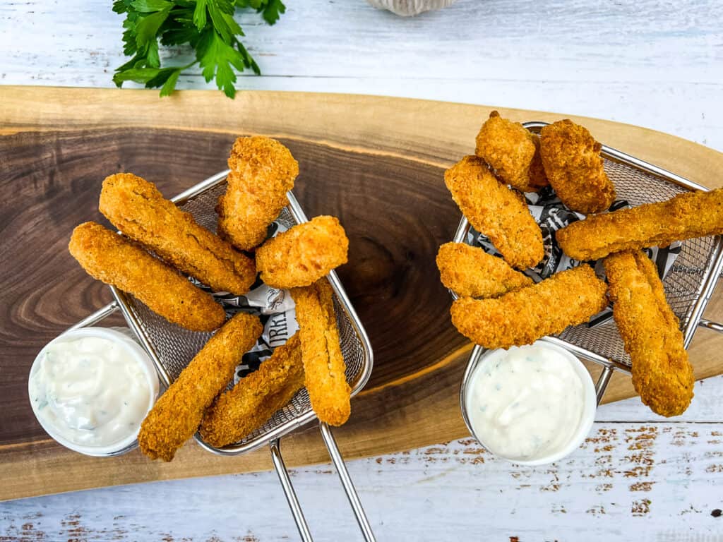 air fryer chicken fries in baskets with dipping sauce