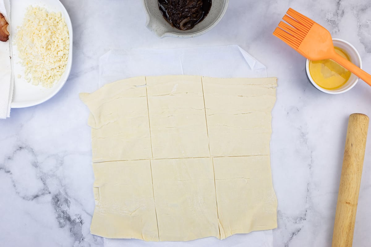 puff pastry cut into squares to make cheese and bacon turnovers
