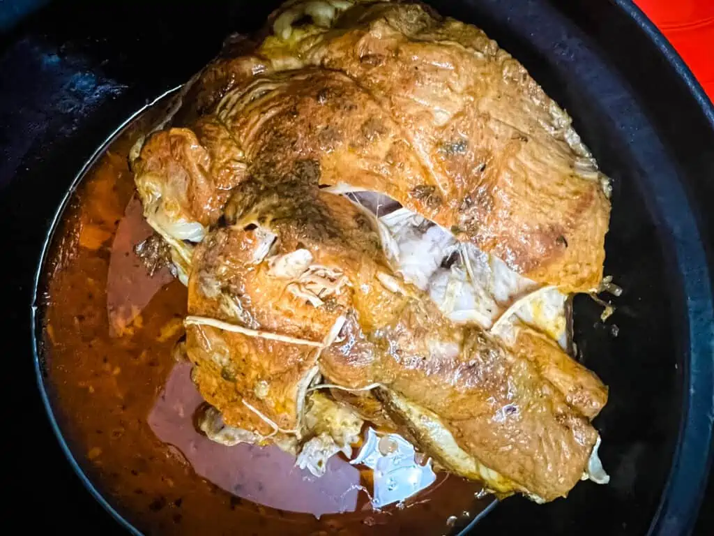 fall apart tender carnitas in the dutch oven.