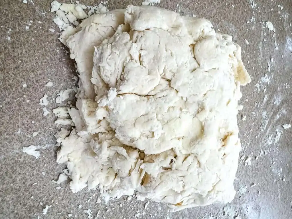 biscuit dough patted into another rectangle
