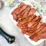 homemade pastrami on a white platter