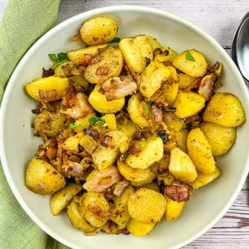 Blackstone fried potatoes in a serving bowl.