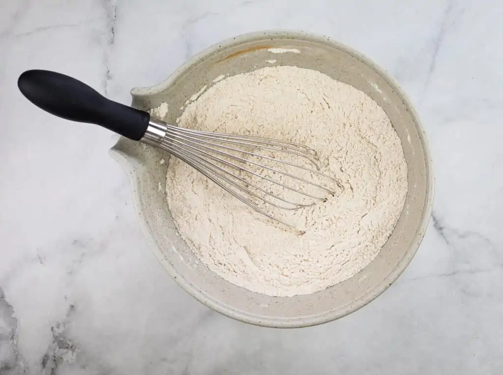 Dry ingredients mixed in a bowl.