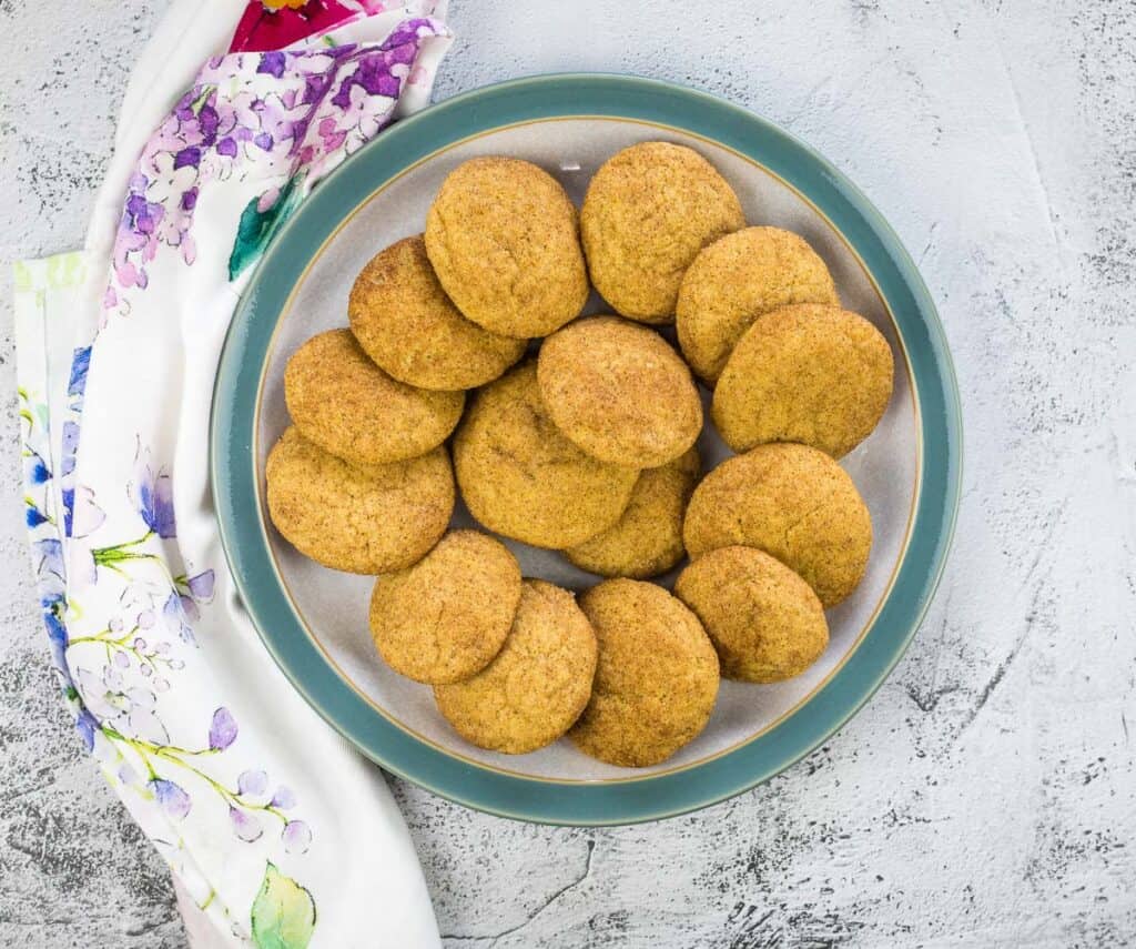 pumpkin snickerdoodle cookies on a plate