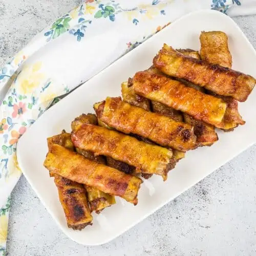 A top down shot of Smoked Shotgun Shells on a platter