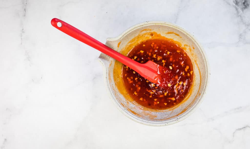 red pepper glaze in a small bowl
