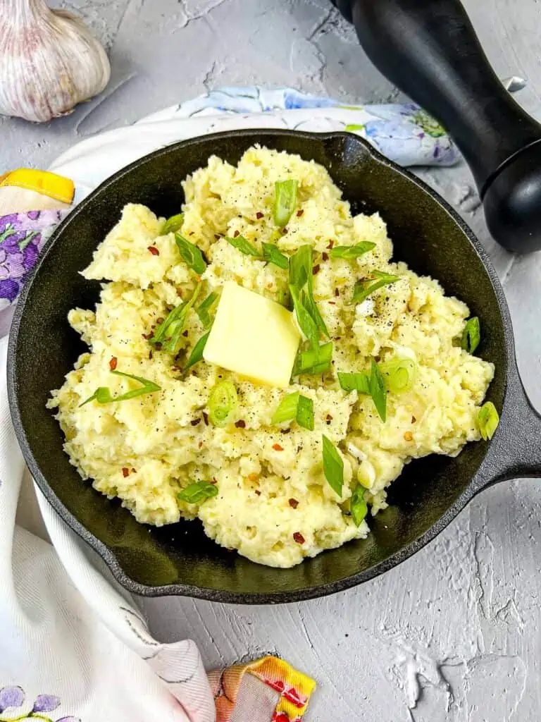 smoked mashed potatoes in a serving skillet
