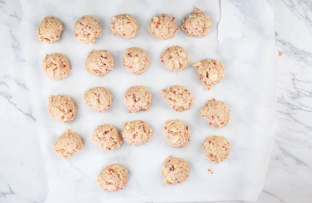 Use a 2-tablespoon cookie scoop to portion the dough onto the prepared baking sheets,