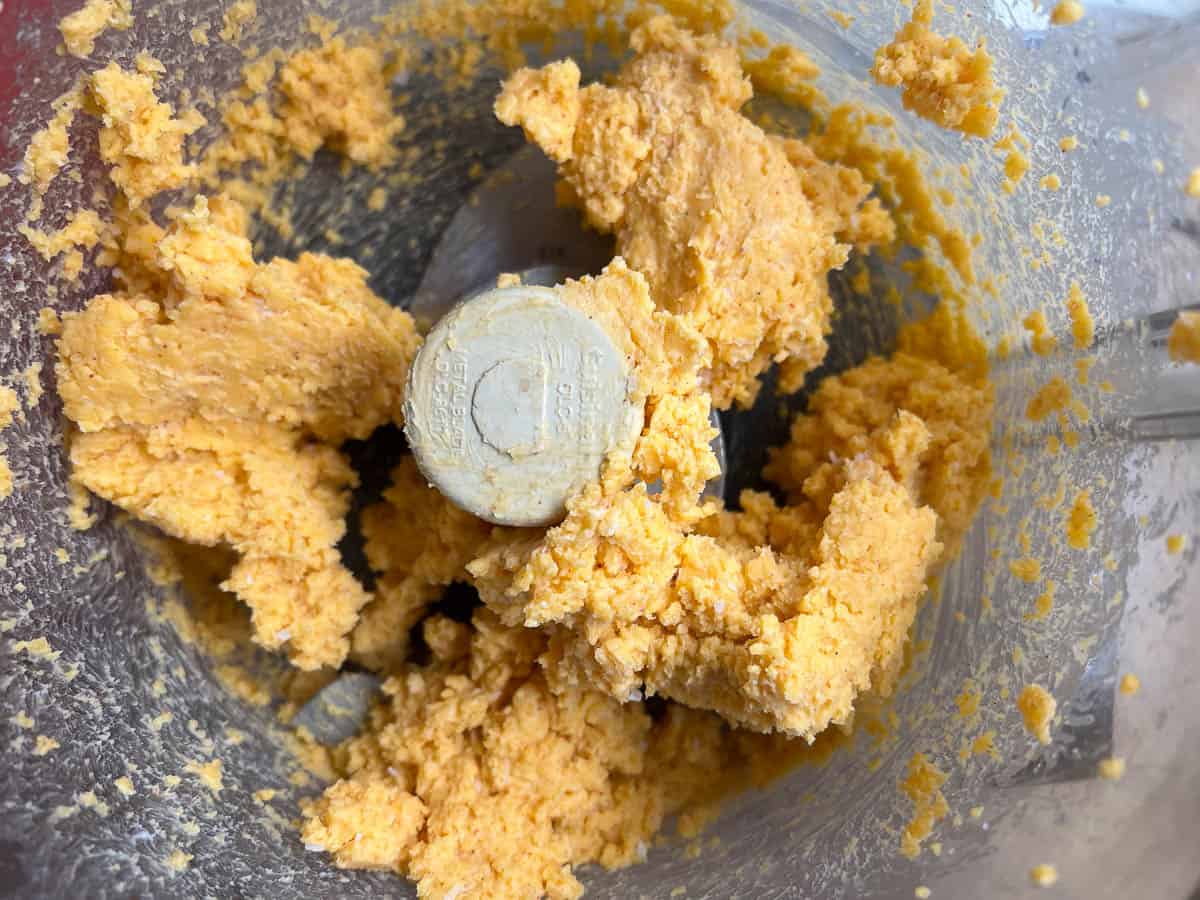 cheese and butter mixed in a food processor