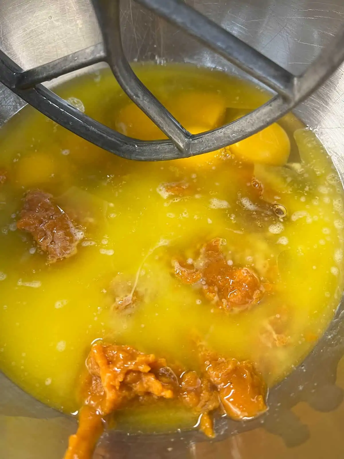 mixing the egg, pumpkin and butter