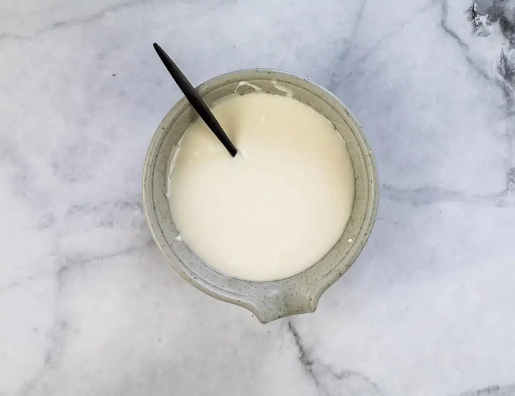 mixed royal icing in a small bowl