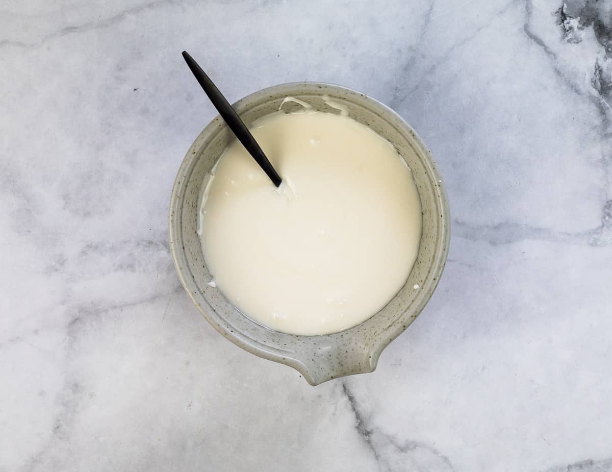 mixed royal icing in a small bowl