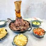 pulled meat from smoked thor's hammer in a black dish