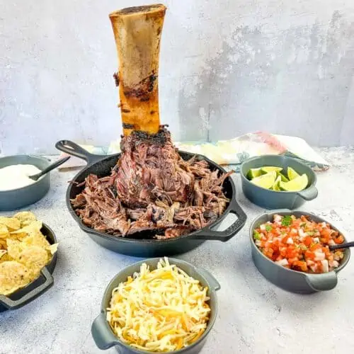 pulled meat from smoked thor's hammer in a black dish