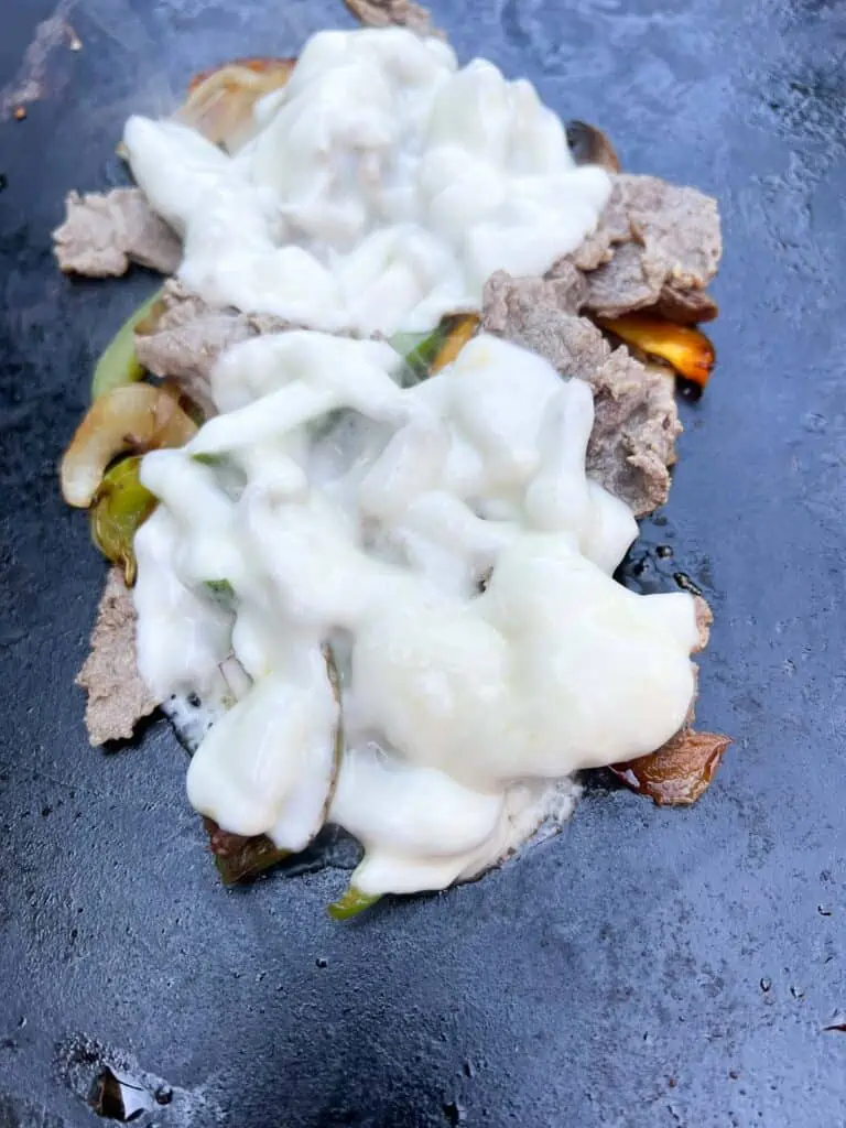 top with cheese, melt and serve