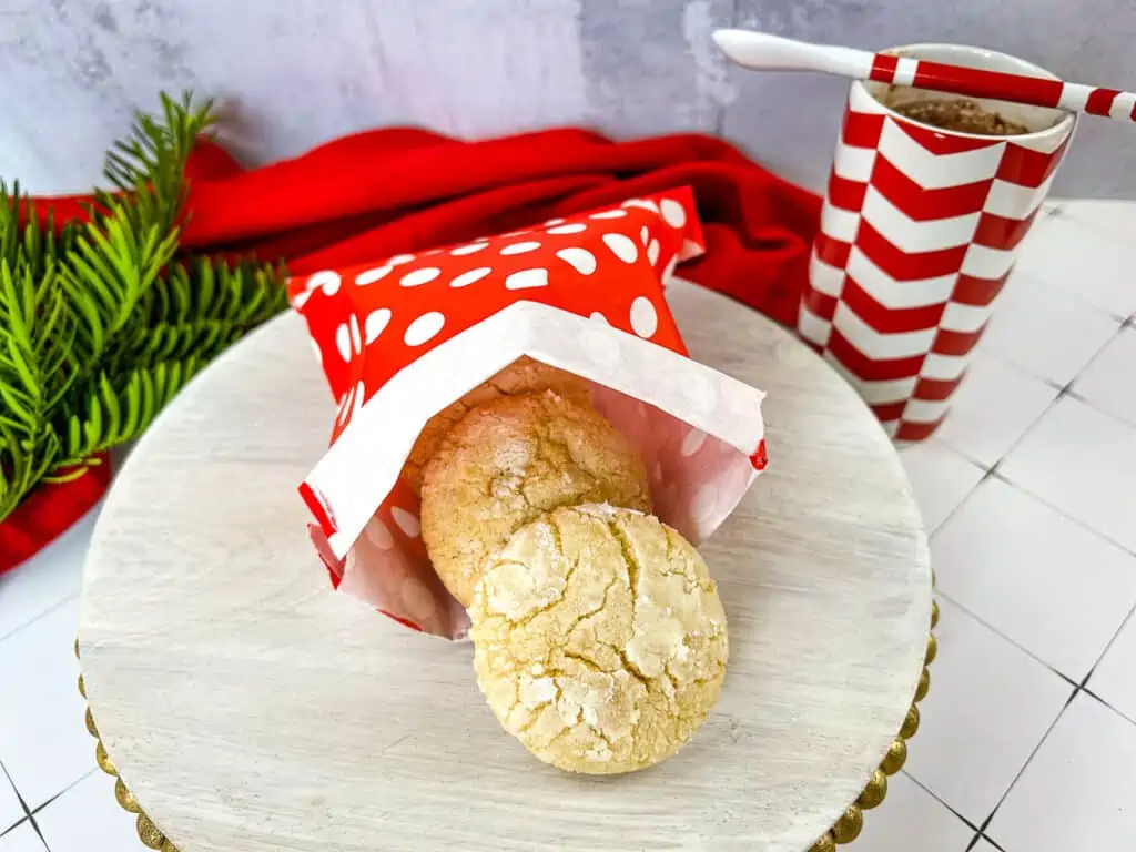 white chocolate crinkle cookies in a red bag