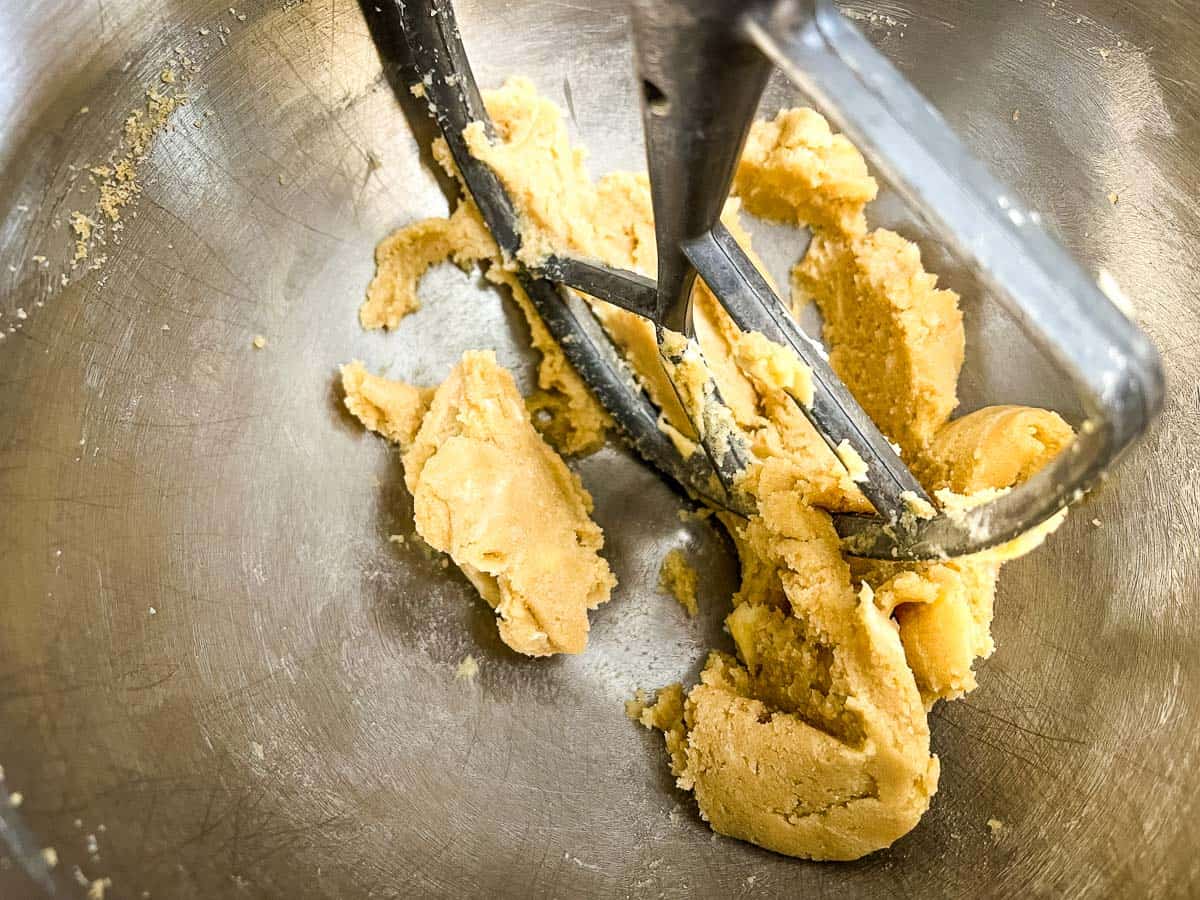 Butter and sugars creamed in a bowl.