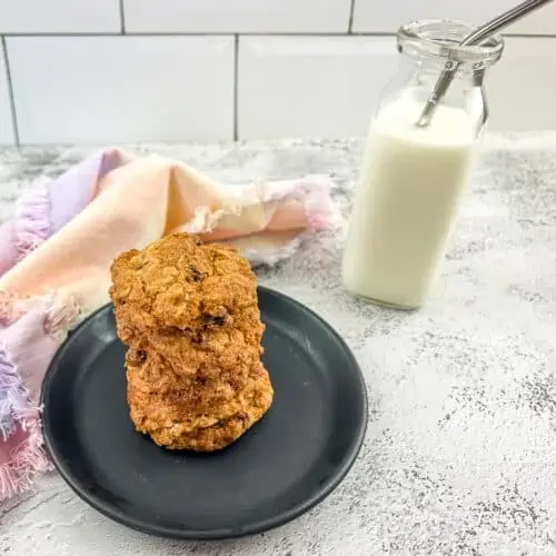 Finished Air Fryer Oatmeal Raisin Cookies with milk.