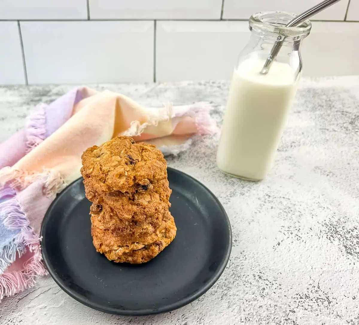 Finished air fryer oatmeal raisin cookies with milk.