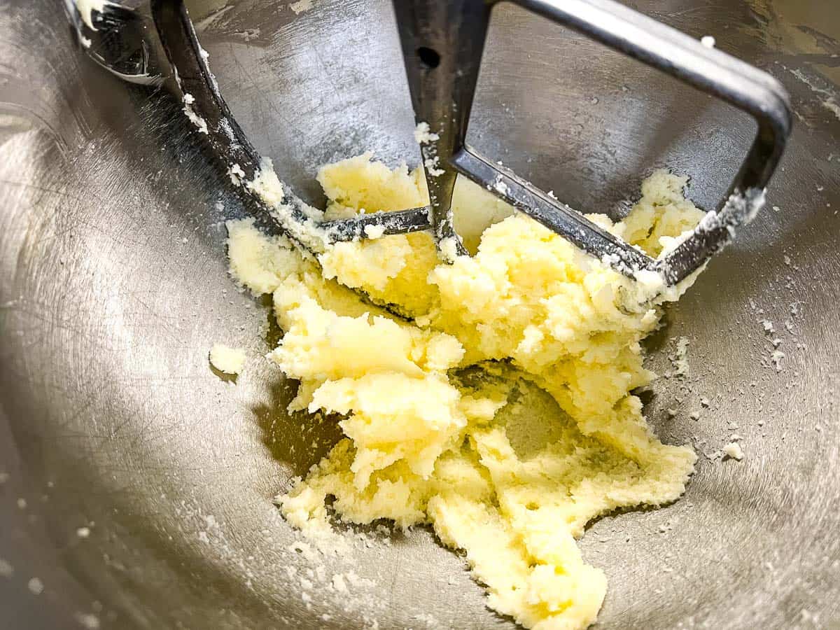 Creaming the butter and sugar in a bowl.