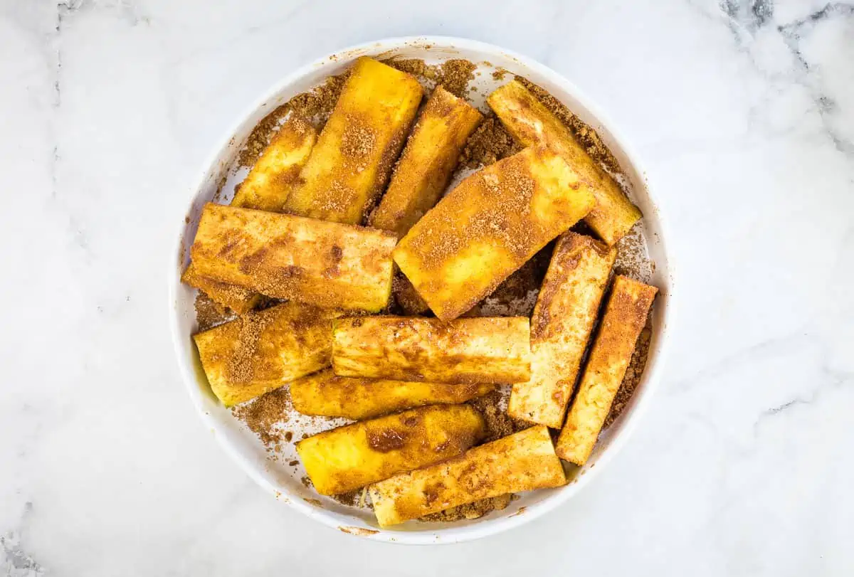 Pineapple spears tossed with the brown sugar spice mixture.