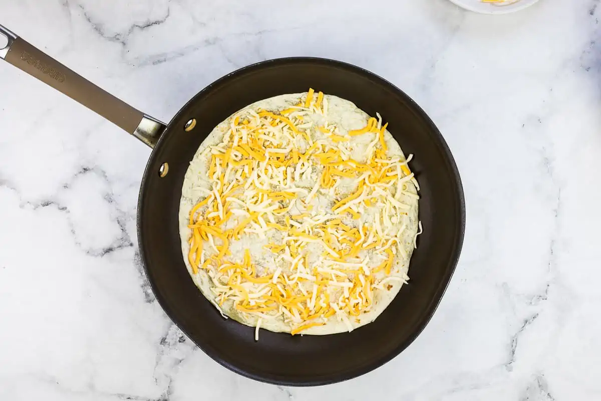 Cheese added to the tortilla.