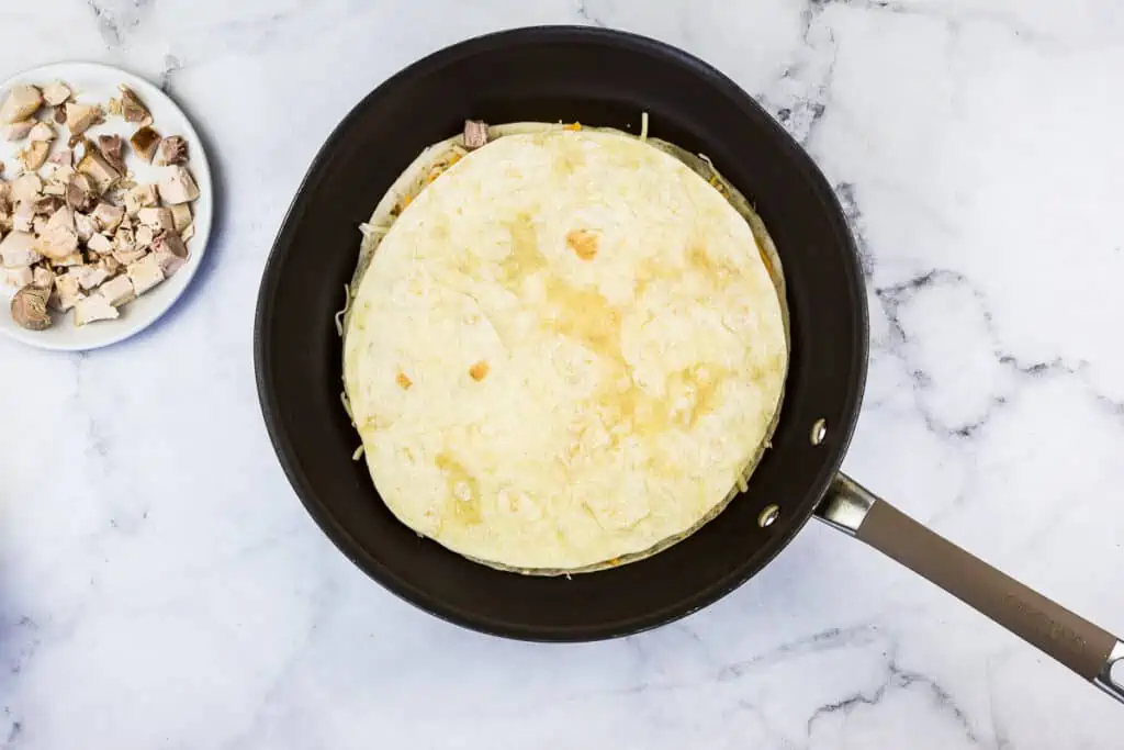 Quesadilla topped with another tortilla.