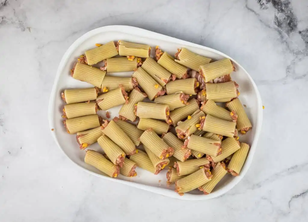 A plateful of stuffed rigatoni noodles.